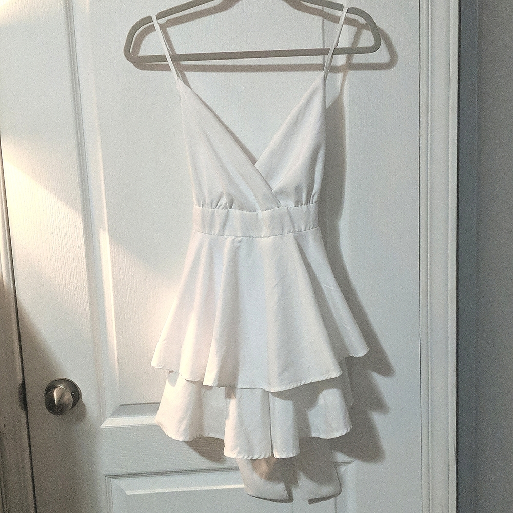 2/$35✨ Forever 21 white spaghetti strap romper, size medium, tie back